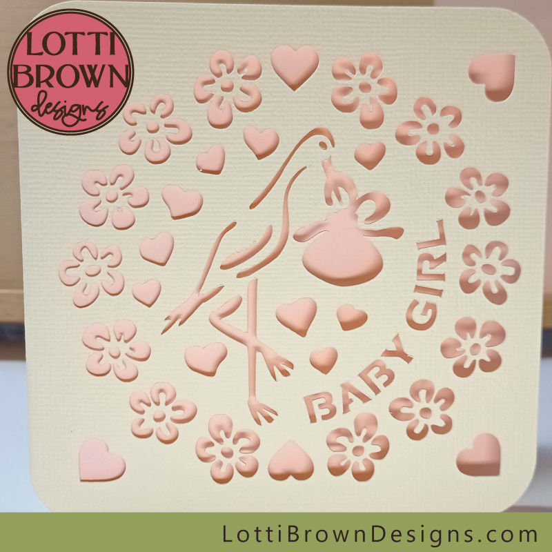 Pink and cream baby girl card with stork