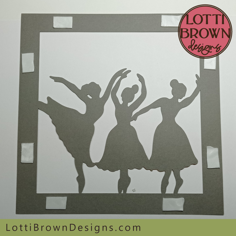 Add double-sided sticky tabs around the edges on the back of the ballerina silhouette layer