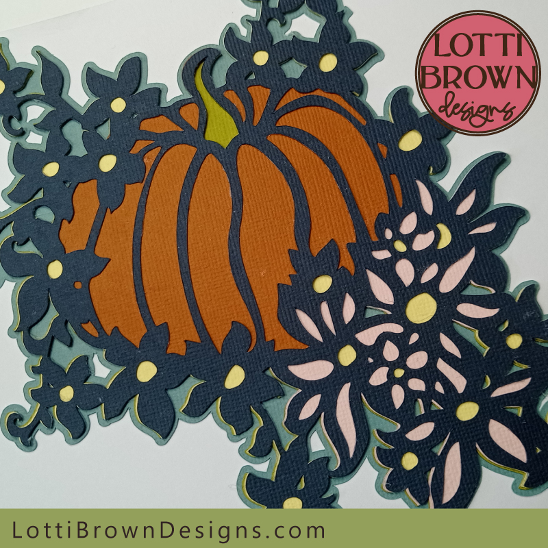Close up look at the pumpkin and flowers design