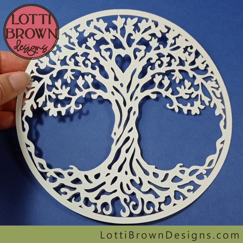 Small circle tree of life cut file in cardstock - against blue background
