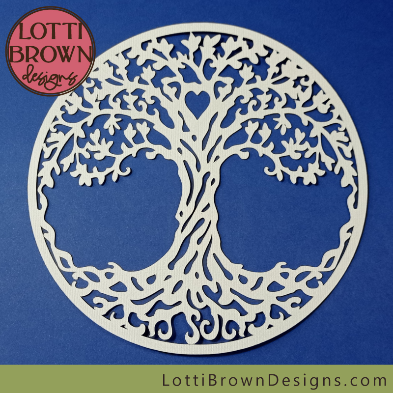 Tree of life cut in off-white cardstock with Cricut