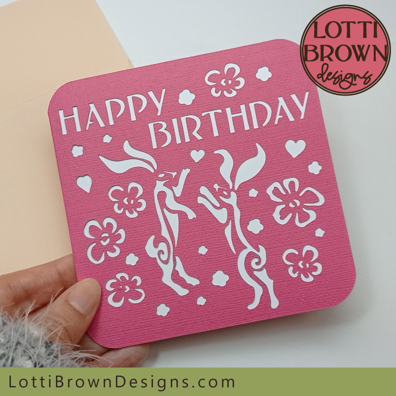 Pretty pink dancing hares or rabbits birthday card SVG template
