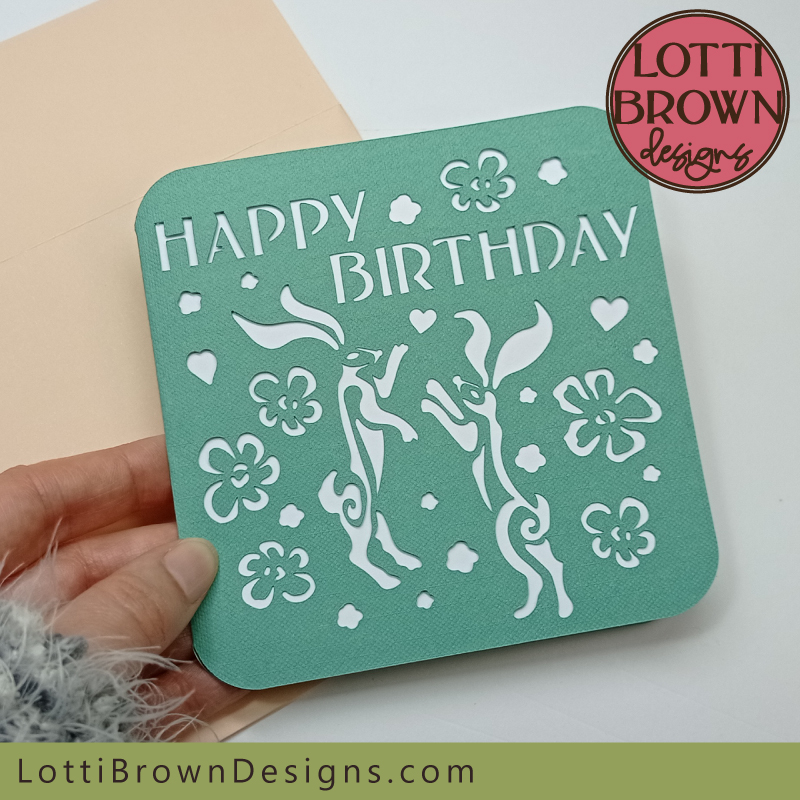 Teal rabbits or hares birthday card SVG