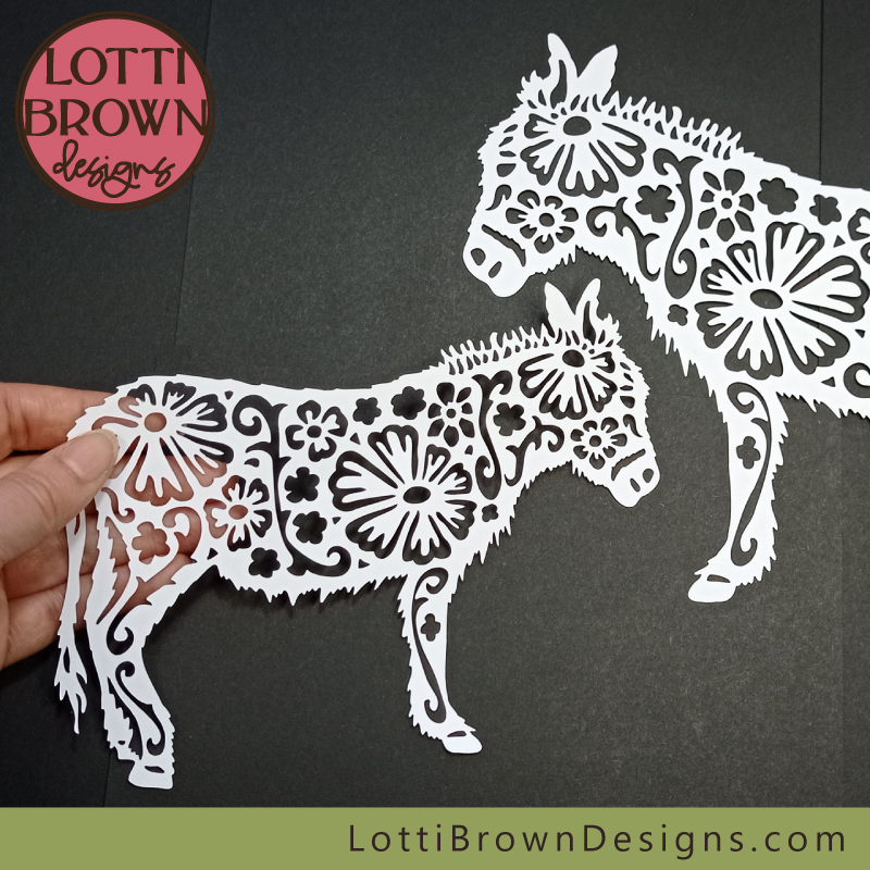 Beautiful papercut donkeys with floral designs