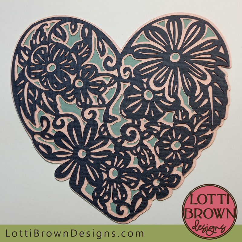 Swirly floral heart papercut with three layers