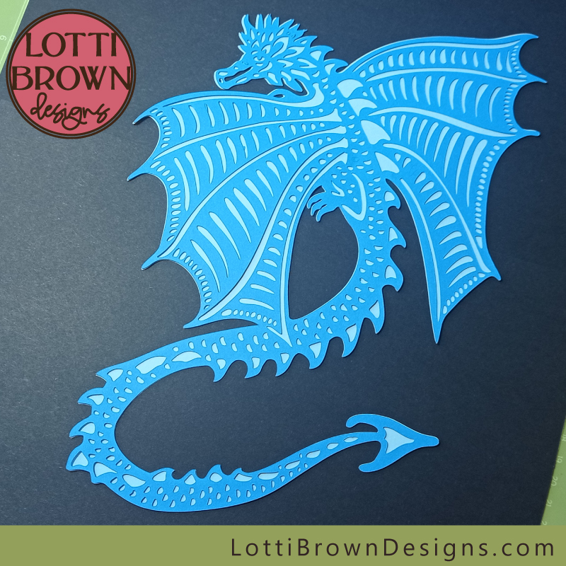 Flying dragon SVG cut in blue craft card