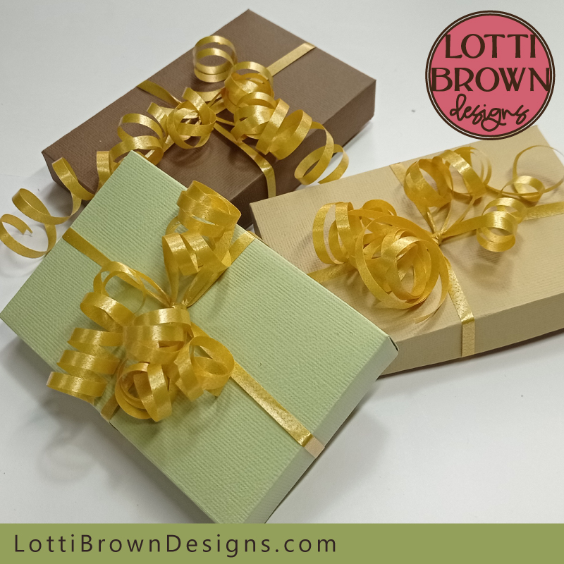 Gift card boxes tied with florists ribbon