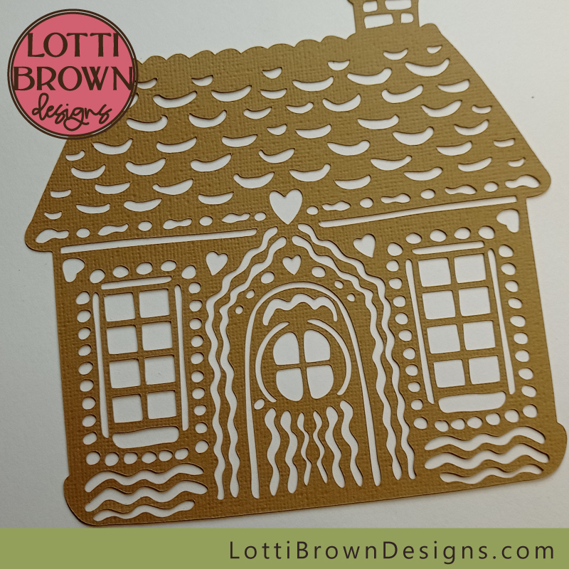 Biscuit-color cardstock gingerbread house papercut template - close up