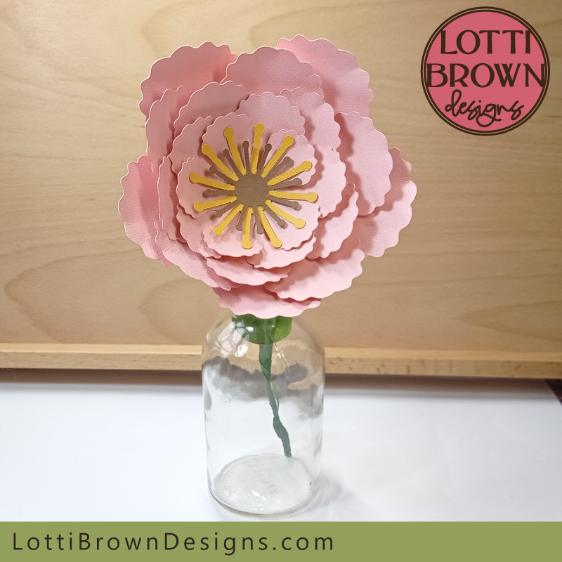 You can add a stem to your paper flower if you wish