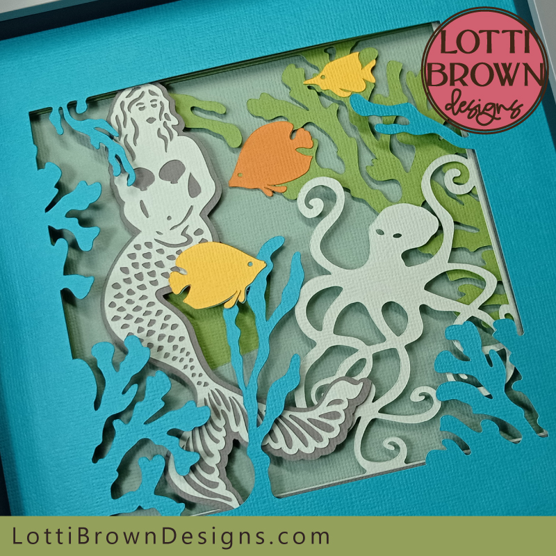 Mermaid shadow box in teal, green, yellow and orange