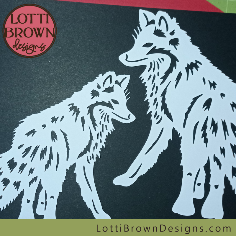 Papercut foxes SVG with one smaller