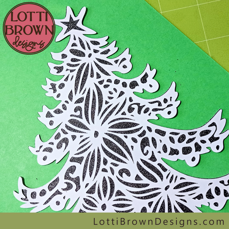 Floral swirly Christmas tree close-up made with glitter card