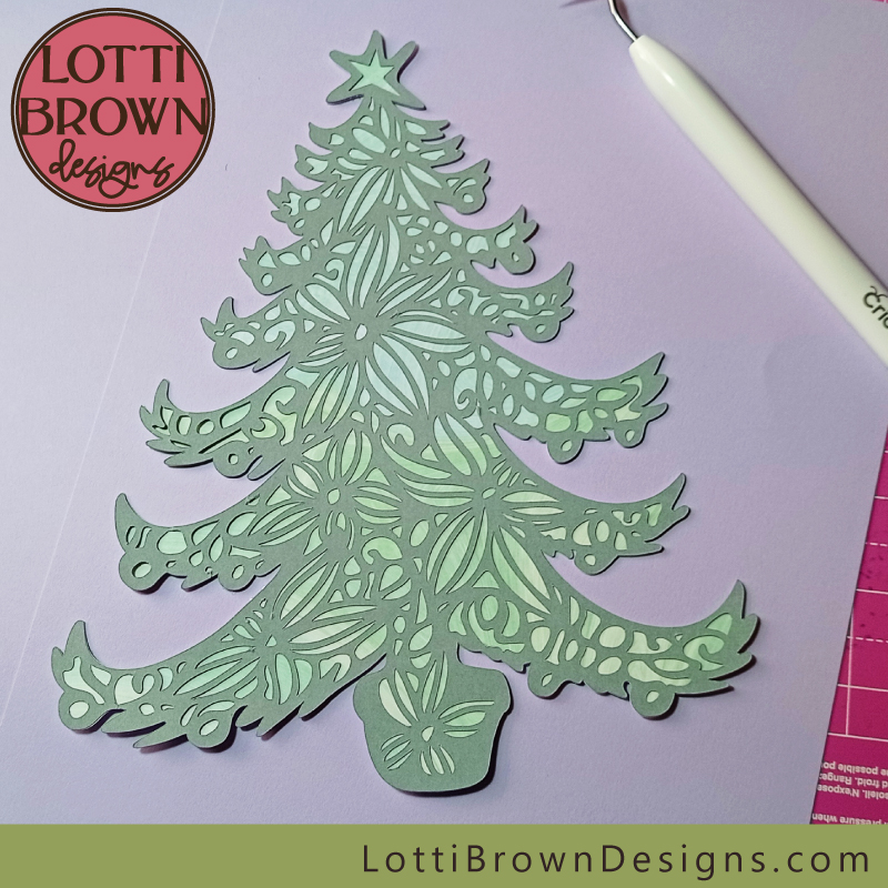 Swirly Christmas tree papercut using marbled paper