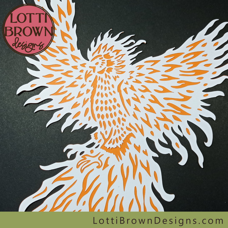 Phoenix cut in white and orange card