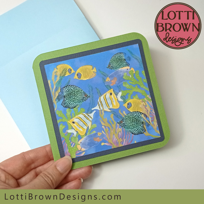 Green and blue tropical fish card