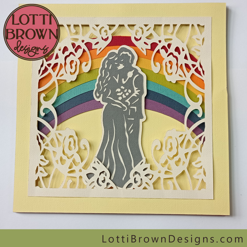 Layered cardstock rainbow wedding shadow box craft project is finished