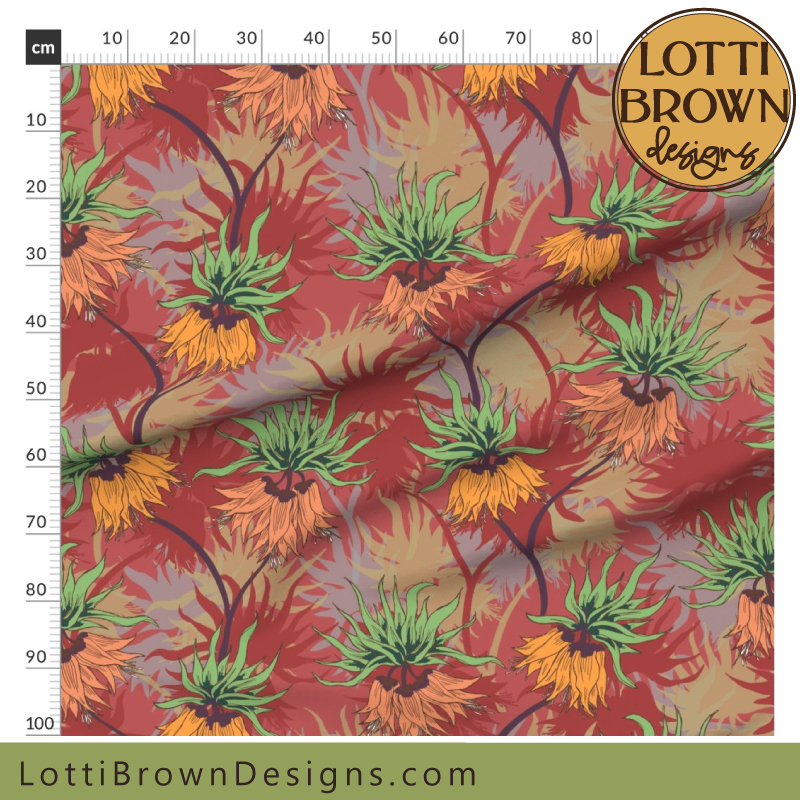 Red maximalist floral fabric with lilies