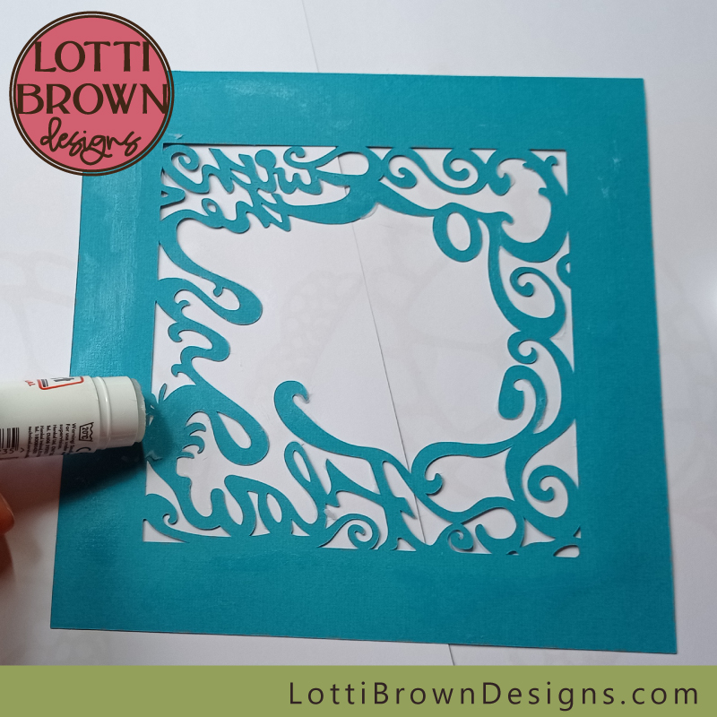 Add paper glue to the reverse of the 'Go with the Flow' lettering layer