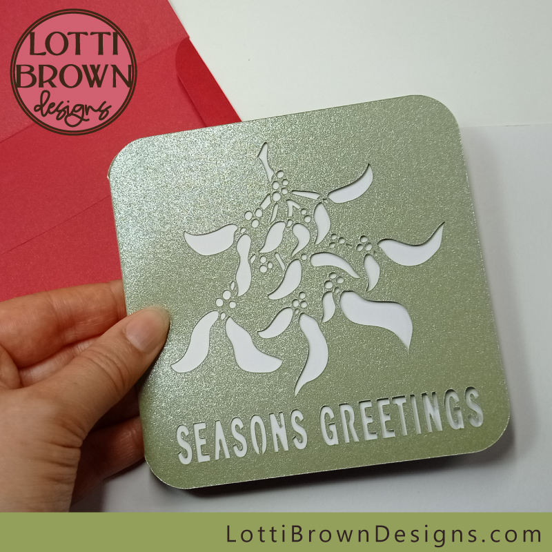 Seasons Greetings Christmas card template with nature design