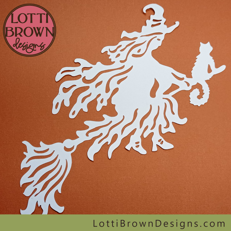 Papercut witch in lightweight white cardstock