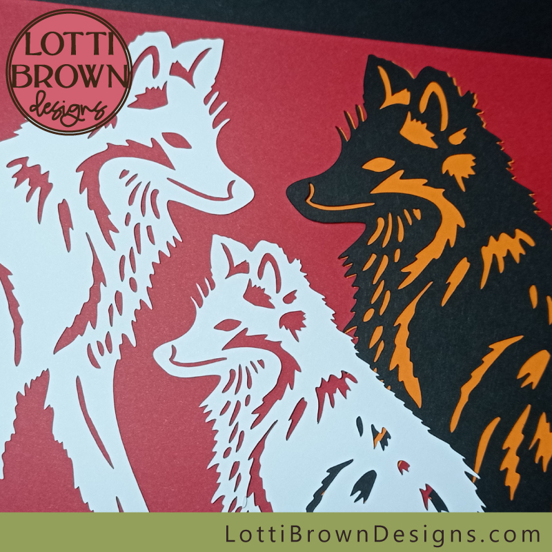 3 papercut foxes