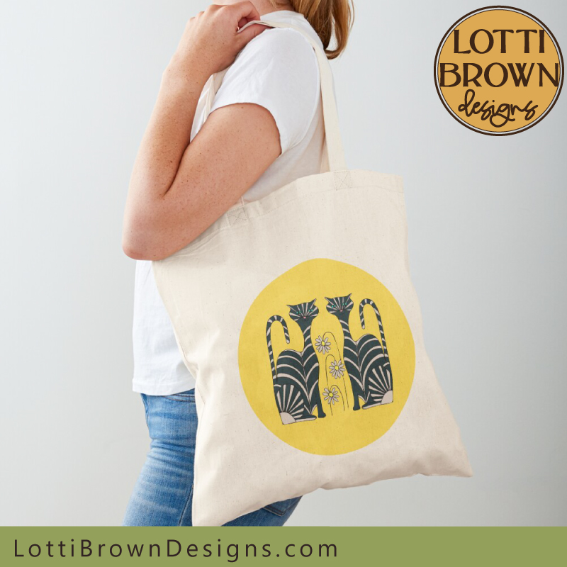 Yellow and black cat tote bag