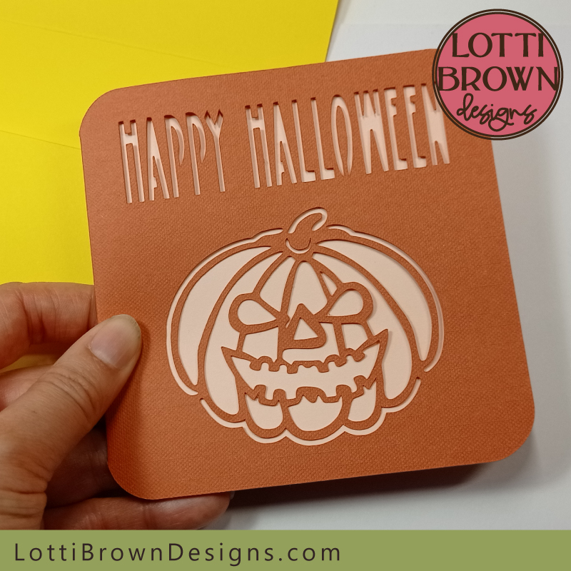 Halloween card template with fun pumpkin face - orange and yellow