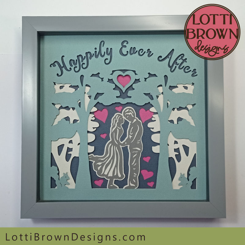 Romantic engagement SVG shadow box template with happy couple and trees