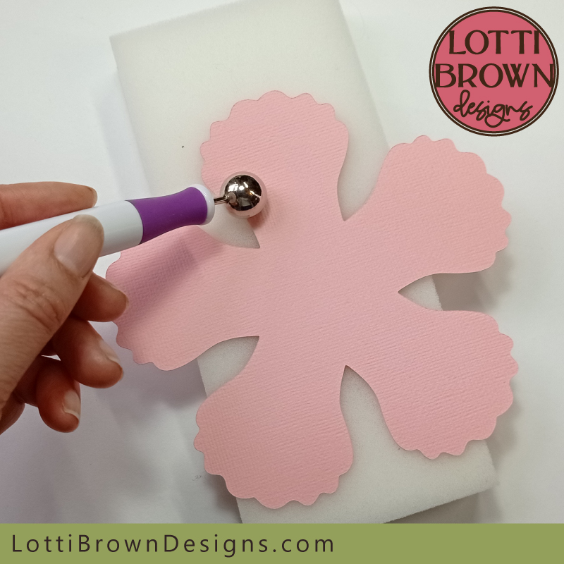 Shaping paper flower petals with a moulding ball tool Use the moulding ball tool to shape the paper flower petals