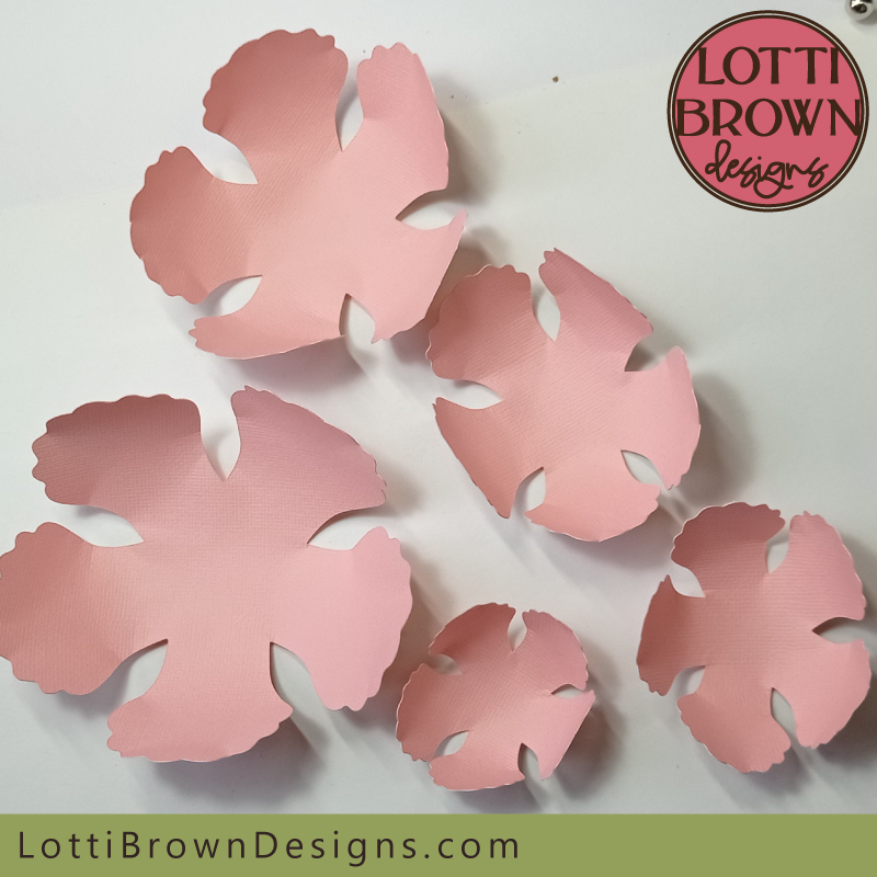 Continue shaping all the paper flower petals Continue until you've shaped all the petals
