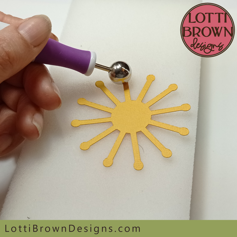 Use the moulding ball tool to shape the flower centres Use your moulding tool to shape the flower centres
