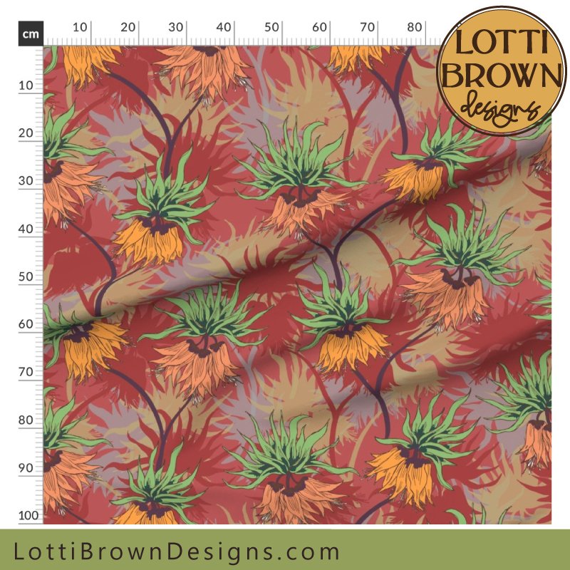Red maximalist floral fabric with lilies