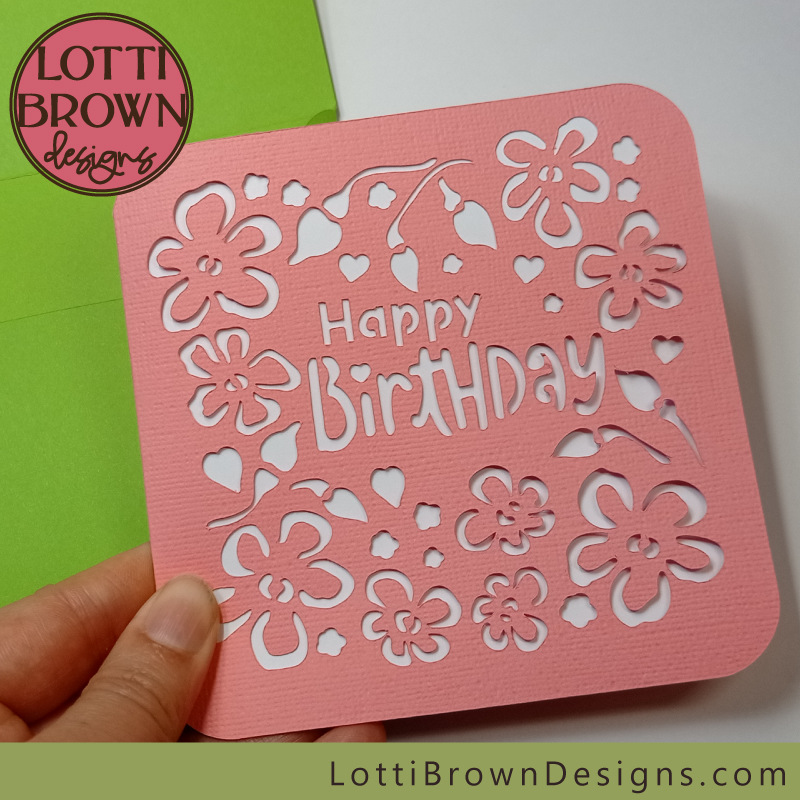 Pretty pink birthday card template with floral design